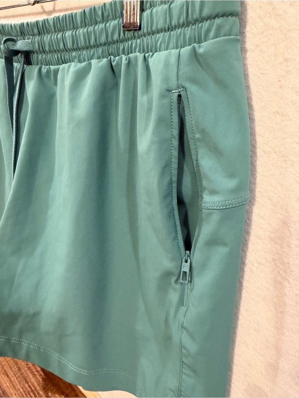 Fabletics Sea-foam Green Drawstring Workout Shorts with zipper pockets - Picture 2 of 13